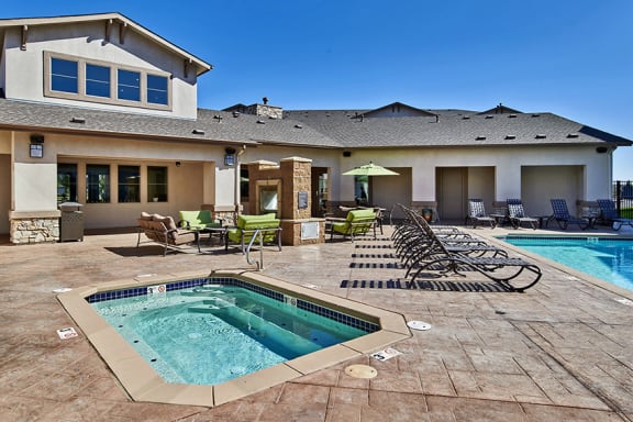 First and Main Apartments spa with surrounding sundeck