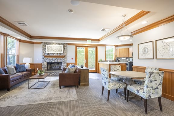 Clubhouse lounge area with fireplace - Springbrook Apartments