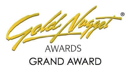 a logo with the words gold award grand award on a white background