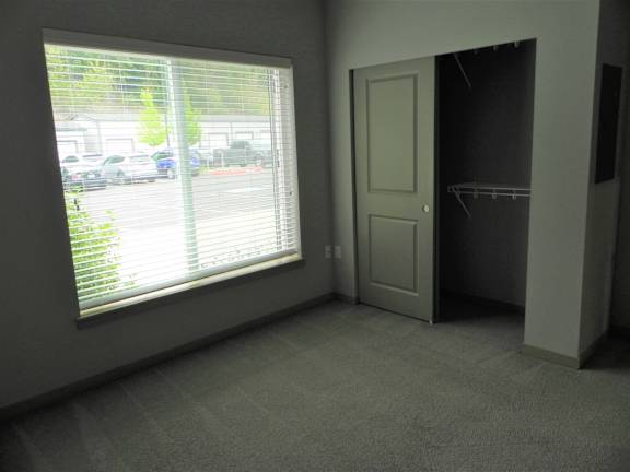 Spacious bedroom with closet at The Charleston Port Orchard, Washington