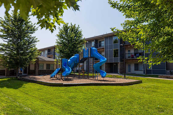 A Blue Slide in a Playground at Capitol Grove Apartments, Des Moines, IA