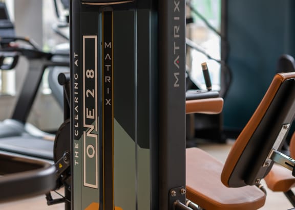 a row of exercise machines in a gym  at The Clearing at ONE28, Olathe, KS