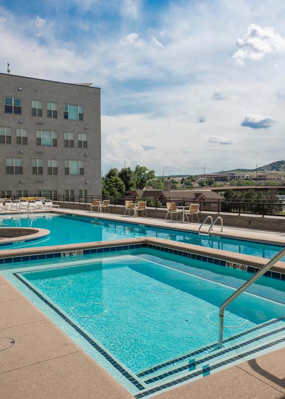 A swimming pool with a mountain in the background.