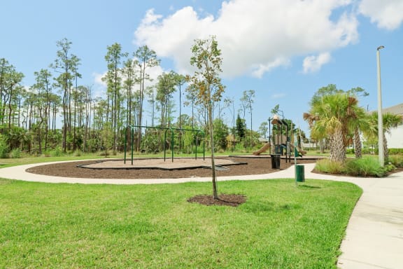 a playground at the whispering winds apartments in pearland, tx at The Crest at Naples, Florida, 34113