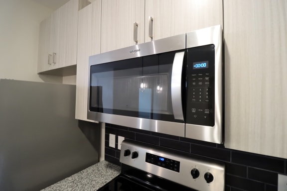 a stainless steel microwave oven in a kitchen at The Crest at Acworth, Georgia