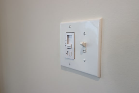 a white light switch on a white wall at The Crest at Acworth, Acworth, GA, 30102