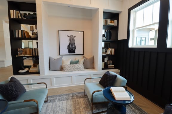 a living room with a couch and two chairs at The Crest at Acworth, Georgia