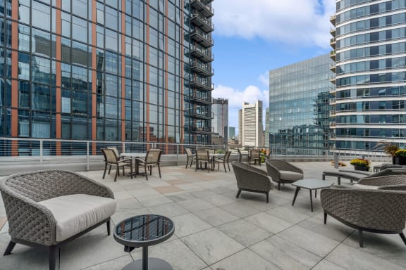 rooftop terrace and social gathering area with comfortable seating at Via Seaport apartments