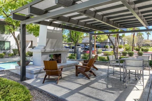 outdoor patio and fireside retreat at Avora apartmetns