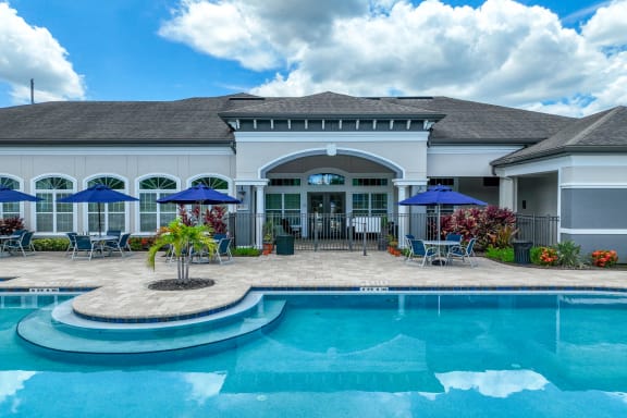 a swimming pool at The Reserves at Alafaya apartments