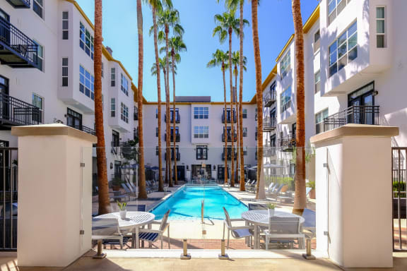 swimming pool and poolside lounging areas at Roosevelt Square apartments