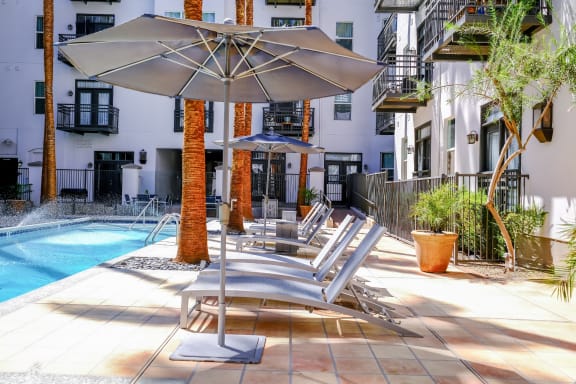 poolside lounging area at Roosevelt Square apartments