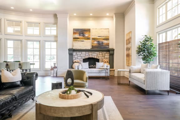 social lounge with fireside conversation areas at Stoneleigh on Spring Creek apartments