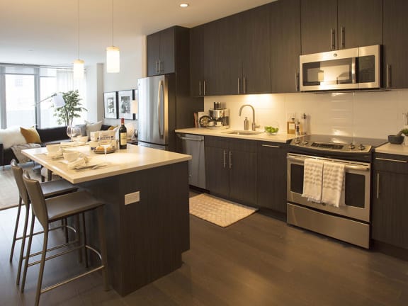 Fully Equipped Kitchen In Clubhouse at The Benjamin Seaport Residences, Boston, Massachusetts