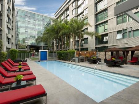 Resort-Inspired Lap Pool With Sundeck at Met Lofts, Los Angeles, CA, 90015