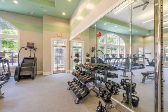 Ellington Metro West apartments fitness center with free weights