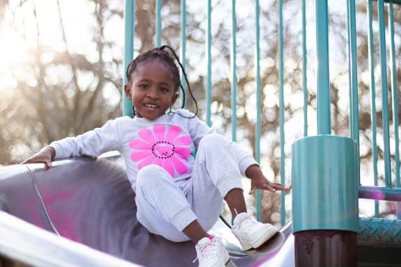 Girl at Playground at Ellington Metro West, Westborough
