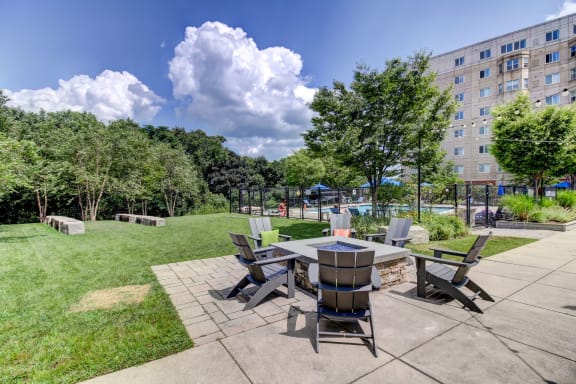 Outdoor Living Green Space with Firepit and Outdoor Movies--HighPoint Apartments Quincy MA