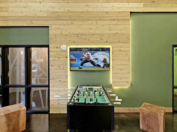 Common area with foosball table at Elan Redmond Apartments, Redmond, Washington