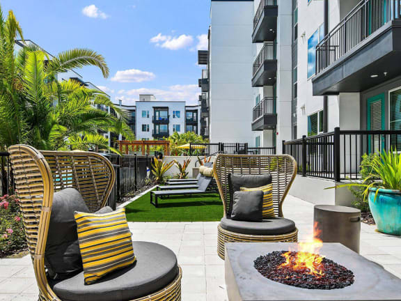 Two Courtyard Fireside Retreats with Comfortable Armchair Seating at Berkshire Winter Park, Winter Park
