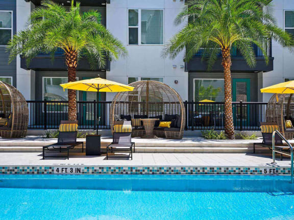 Lavish Pool with Sun Deck & Lounge Seating and Shaded Cabanas at Berkshire Winter Park, Florida, 32789