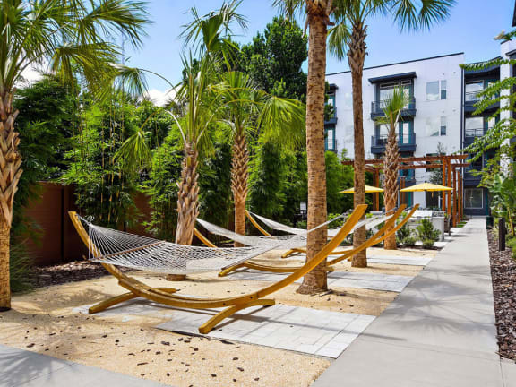 Lush, Landscaped Terrace Outfitted with Hammocks at Berkshire Winter Park, Winter Park, FL