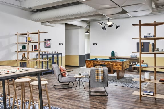 The Edison apartments game room with billiards