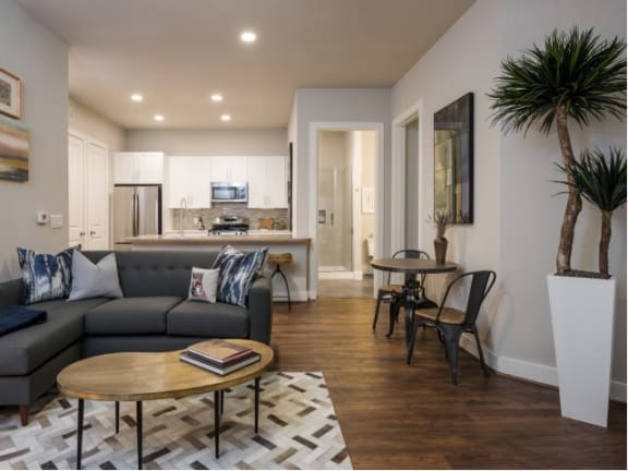 spacious open-concept kitchen and living room at Tinsley on the Park apartments