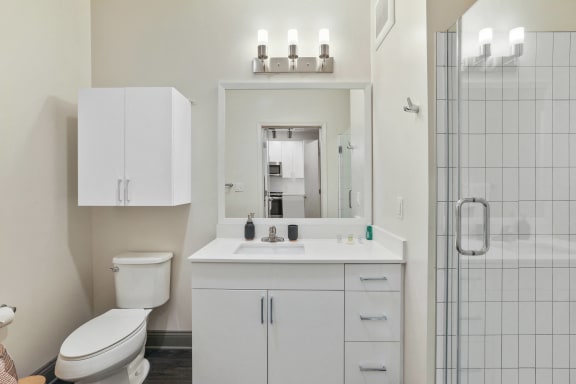 Trellis House apartments bathroom with white vanity