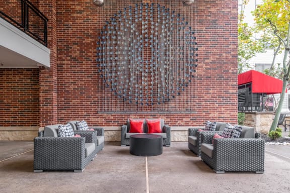 outdoor patio with lounge seating at The Core apartments