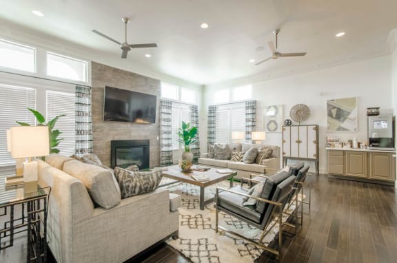 Living room with sofa and TV at Park 3Eighty, Aubrey, Texas