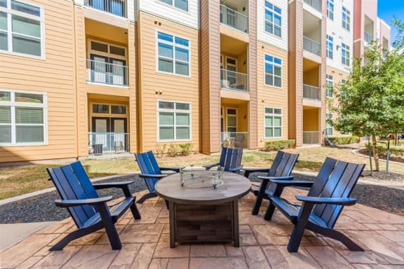 outdoor fireside lounging area at Aspire at 610 apartments