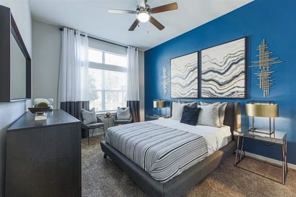 bedroom with ceiling fan at Aspire at 610 apartments
