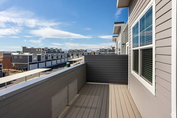 Private balcony with a view of clear sky at Brownstones at Palisade Park,  Colorado, 80023