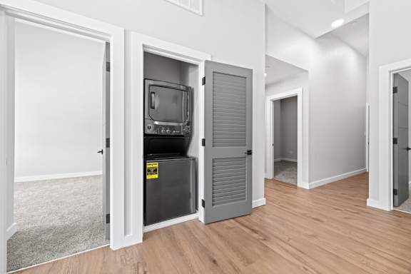 A room with a television in a cabinet at The Avenue Lofts Golden Apartments, Golden