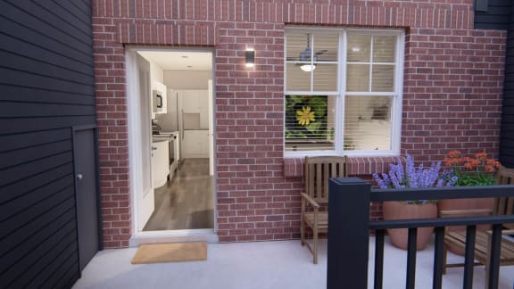 a view into the kitchen from the balcony at Brownstones at Palisade Park Townhomes Broomfield, CO