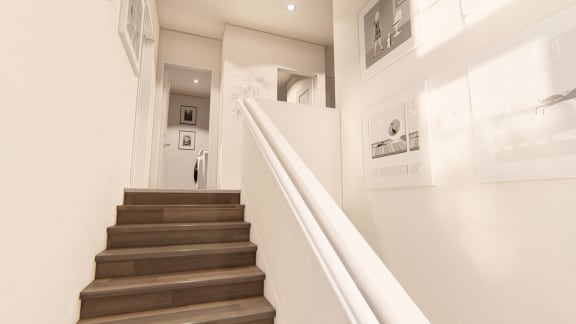 a view of the stairwell from the bottom of the stairs at Brownstones at Palisade Park Townhomes, Colorado, 80023
