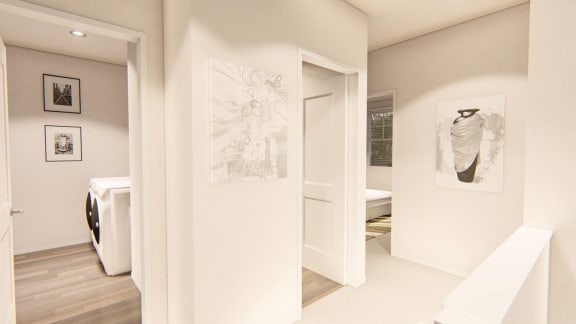 a hallway with white walls and wood floors at Brownstones at Palisade Park Townhomes, Broomfield Colorado