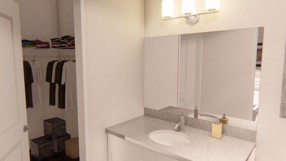 a bathroom with a sink and a mirror at Brownstones at Palisade Park Townhomes, Colorado