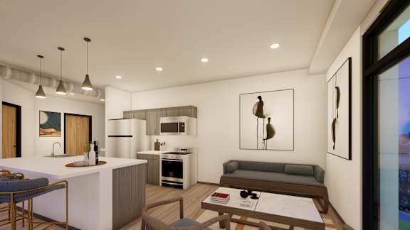A modern kitchen with a dining table and chairs.