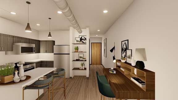 A modern kitchen with a dining area and a living area.