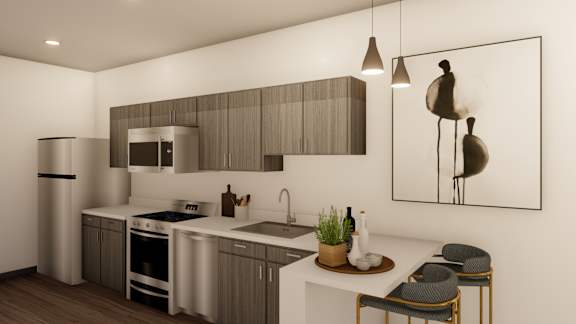 A modern kitchen with a refrigerator, oven, sink, and cabinets.