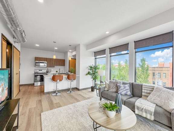 a living room with a couch and a table