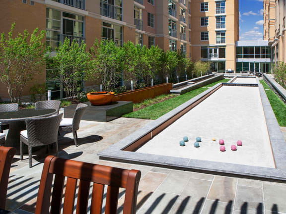 Courtyard with bocce balls at Highland Park at Columbia Heights Metro, Washington