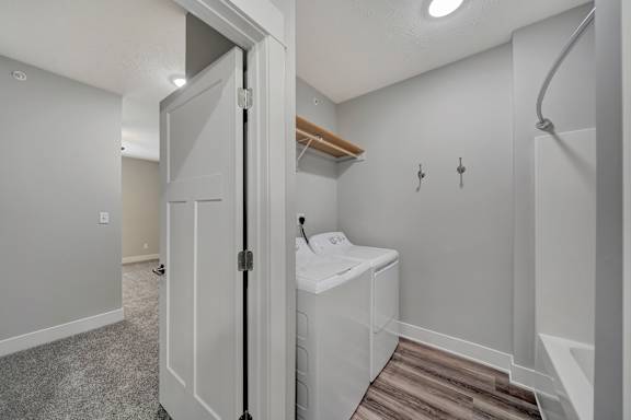 the closet in a remodeled bathroom with a mirrored closet door
