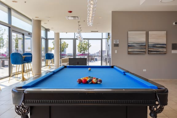 Pool in game room at The Madison at Racine, Chicago, IL, 60607