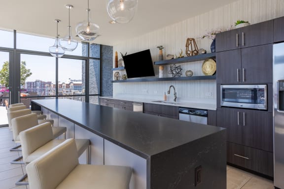 Large kitchen with a long counter at The Madison at Racine, Chicago, IL