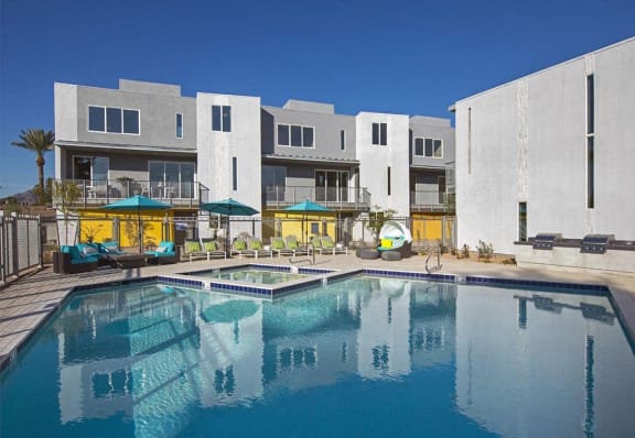a large swimming pool in front of a building at Novella Arcadia, Phoenix