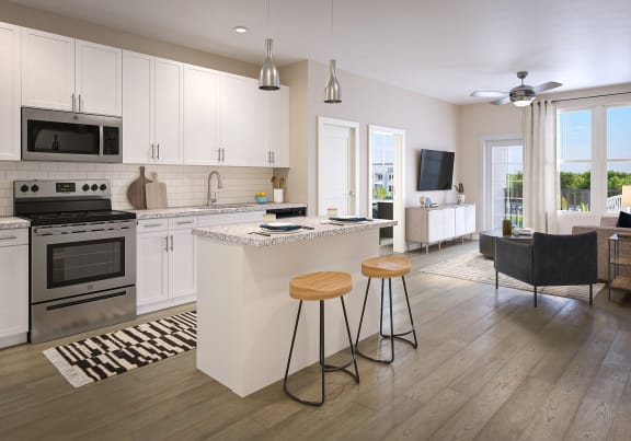 a kitchen and living room with an island and two stools