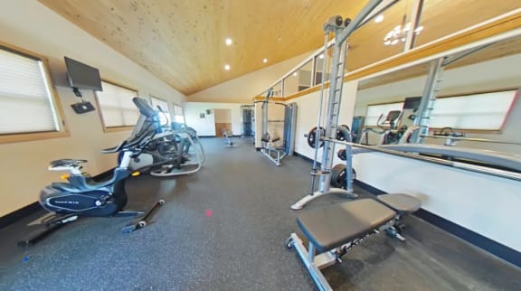 Fitness Center Equipped with Free Weights and Machines at Boulder Ridge Apartments